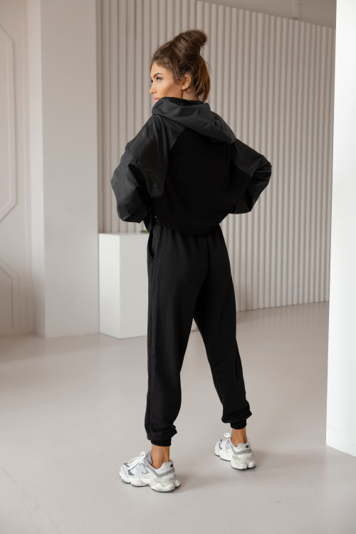 Women's hooded tracksuit set with eco-leather sleeves – Black