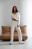 Two-piece beige women's set with a V-neck